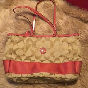 Coach tote or diaper bag with changing pad insert
